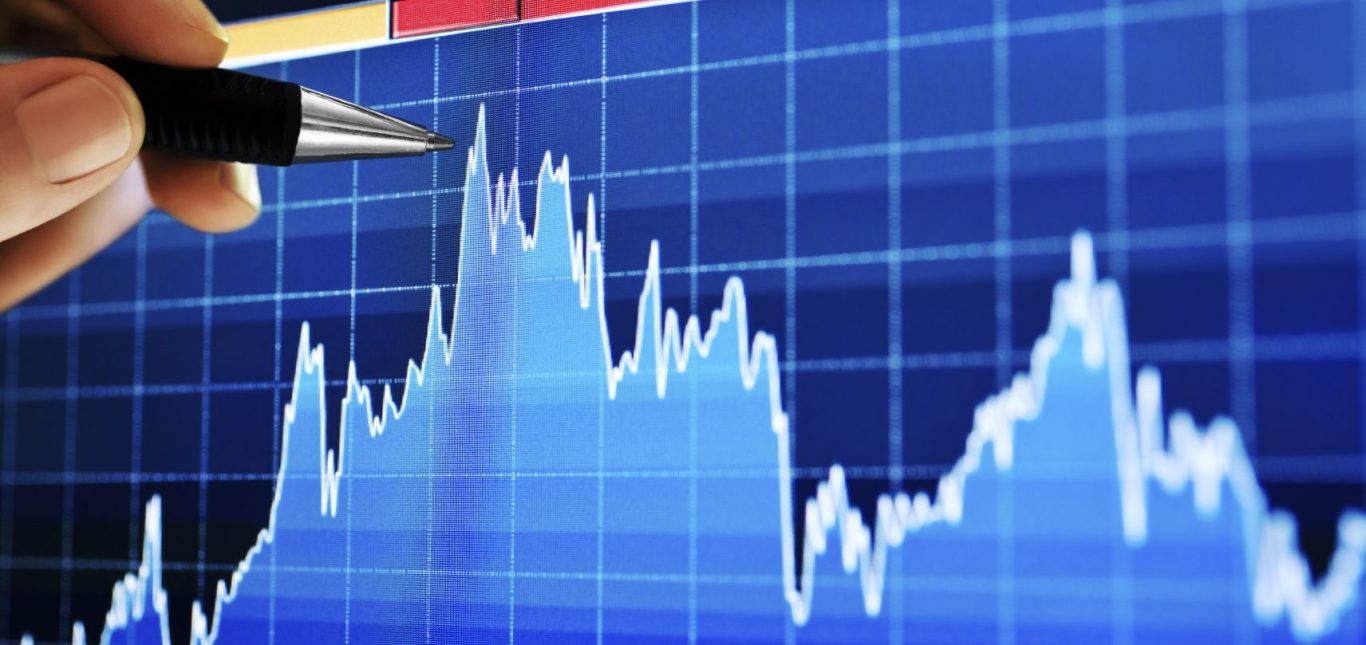 A marketing analyst looking over the results of his SEO and Pay Per Click Campaign management.